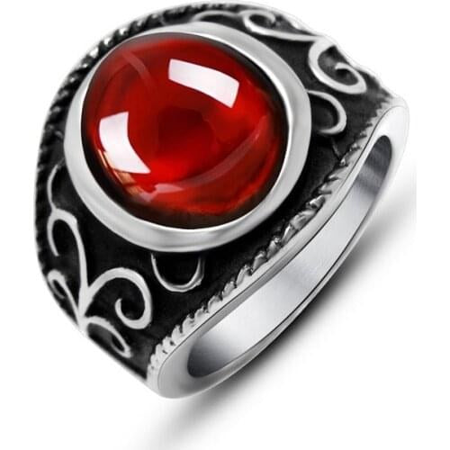 Silver floral engraved band with red garnet stone
