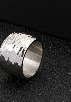 Silver wide wave-textured gothic band ring